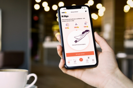 Woman holding phone with app